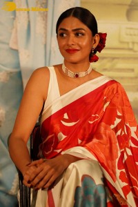 Mrunal Thakur attending a movie function dressed in a saree