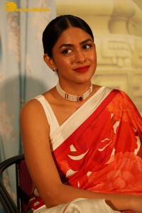 Mrunal Thakur attending a movie function dressed in a saree