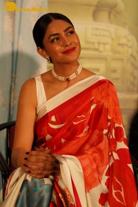 Mrunal Thakur attending a movie function dressed in a saree