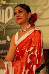 Mrunal Thakur attending a movie function dressed in a saree