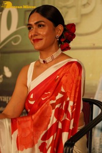 Mrunal Thakur attending a movie function dressed in a saree