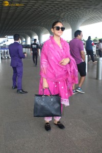 actress mrunal thakur in a pink salwar dress at mumbai airport