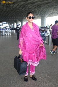 actress mrunal thakur in a pink salwar dress at mumbai airport