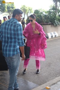 actress mrunal thakur in a pink salwar dress at mumbai airport