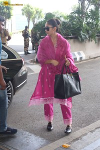 actress mrunal thakur in a pink salwar dress at mumbai airport