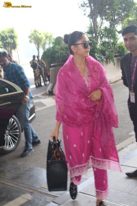 actress mrunal thakur in a pink salwar dress at mumbai airport