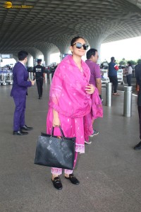 actress mrunal thakur in a pink salwar dress at mumbai airport