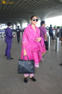 actress mrunal thakur in a pink salwar dress at mumbai airport