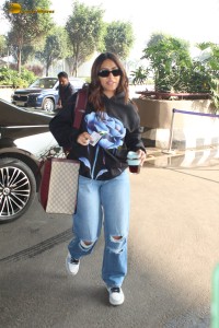 actress Mrunal Thakur stylish looks in denim jeans at mumbai airport