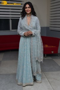 Actress Mrunal Thakur poses for pictures while promoting a movie