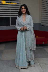 Actress Mrunal Thakur poses for pictures while promoting a movie