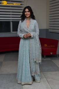 Actress Mrunal Thakur poses for pictures while promoting a movie