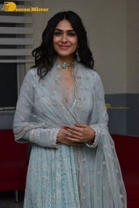 Actress Mrunal Thakur poses for pictures while promoting a movie