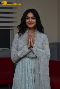 Actress Mrunal Thakur poses for pictures while promoting a movie