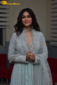 Actress Mrunal Thakur poses for pictures while promoting a movie