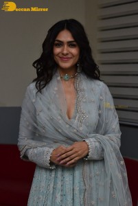Actress Mrunal Thakur poses for pictures while promoting a movie