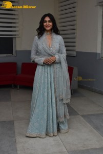 Actress Mrunal Thakur poses for pictures while promoting a movie