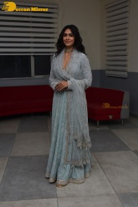 Actress Mrunal Thakur poses for pictures while promoting a movie
