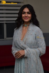 Actress Mrunal Thakur poses for pictures while promoting a movie