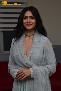Actress Mrunal Thakur poses for pictures while promoting a movie