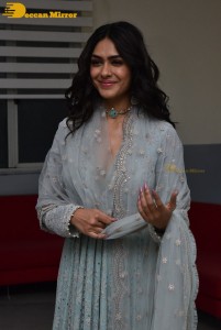 Actress Mrunal Thakur poses for pictures while promoting a movie