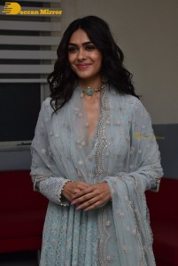 Actress Mrunal Thakur poses for pictures while promoting a movie