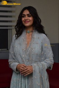Actress Mrunal Thakur poses for pictures while promoting a movie