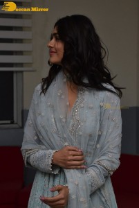 Actress Mrunal Thakur poses for pictures while promoting a movie