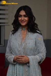 Actress Mrunal Thakur poses for pictures while promoting a movie