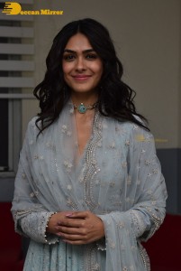 Actress Mrunal Thakur poses for pictures while promoting a movie