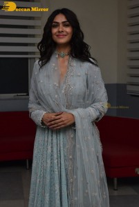 Actress Mrunal Thakur poses for pictures while promoting a movie