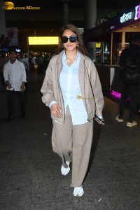 Indian actress mrunal thakur stylish looks in sunglasses at mumbai airport