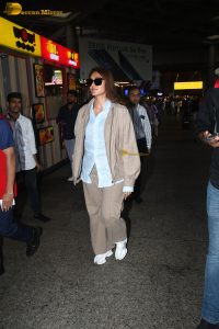 Indian actress mrunal thakur stylish looks in sunglasses at mumbai airport