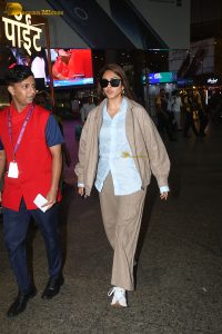 Indian actress mrunal thakur stylish looks in sunglasses at mumbai airport