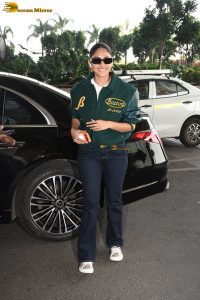 actress Mrunal Thakur stylish in a green jumper