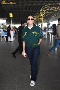 actress Mrunal Thakur stylish in a green jumper
