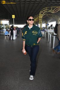 actress Mrunal Thakur stylish in a green jumper