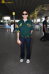 actress Mrunal Thakur stylish in a green jumper