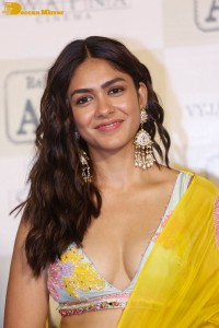 Actress Mrunal Thakur hot look in a yellow lehenga choli