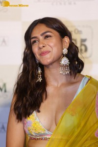 Actress Mrunal Thakur hot look in a yellow lehenga choli