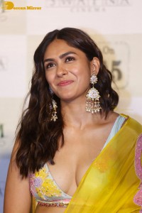 Actress Mrunal Thakur hot look in a yellow lehenga choli