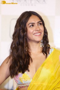 Actress Mrunal Thakur hot look in a yellow lehenga choli