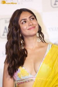 Actress Mrunal Thakur hot look in a yellow lehenga choli