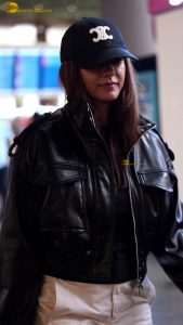 actress Mrunal Thakur stylish in a cap and jacket at mumbai airport