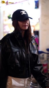 actress Mrunal Thakur stylish in a cap and jacket at mumbai airport