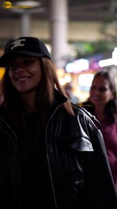 actress Mrunal Thakur stylish in a cap and jacket at mumbai airport