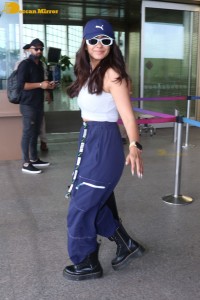 Indian Actress Mrunal Thakur seen in a white top at the Mumbai Airport