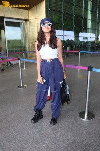 Indian Actress Mrunal Thakur seen in a white top at the Mumbai Airport