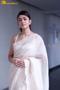 Actress Mrunal Thakur in a white saree