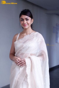 Actress Mrunal Thakur in a white saree